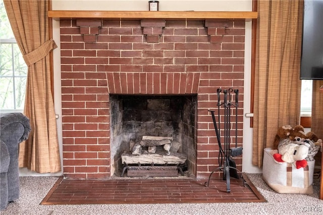 1466 Grant Rd, Russia, NY 13324 - detailed view of carpet flooring and a fireplace with flush hearth