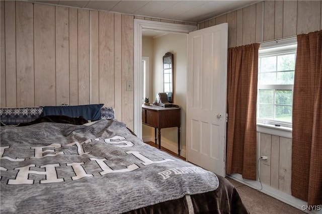 1466 Grant Rd, Russia, NY 13324 - carpeted bedroom with wood walls and multiple windows