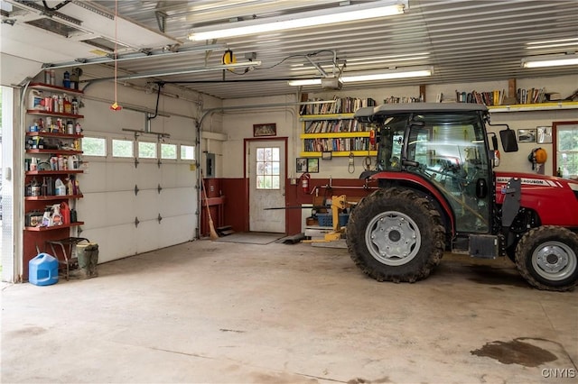 1466 Grant Rd, Russia, NY 13324 - garage featuring a garage door opener