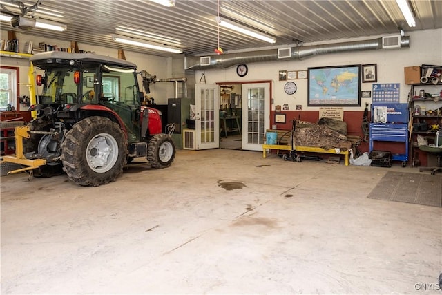 1466 Grant Rd, Russia, NY 13324 - garage featuring a garage door opener