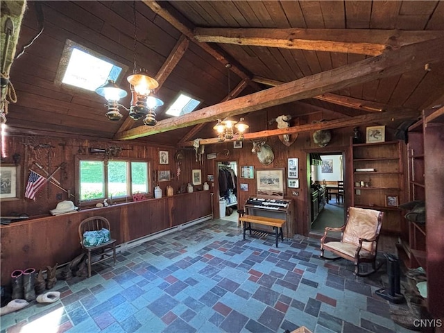 1466 Grant Rd, Russia, NY 13324 - living area featuring wood walls, wood ceiling, and a chandelier