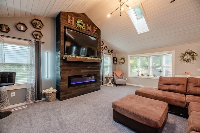 25 San Mateo Rd, Chili, NY 14624 - living room featuring vaulted ceiling, a skylight, carpet flooring, a large fireplace, and wooden ceiling