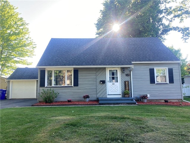 25 San Mateo Rd, Chili, NY 14624 - view of front of home featuring driveway, a front lawn, and a shingled roof