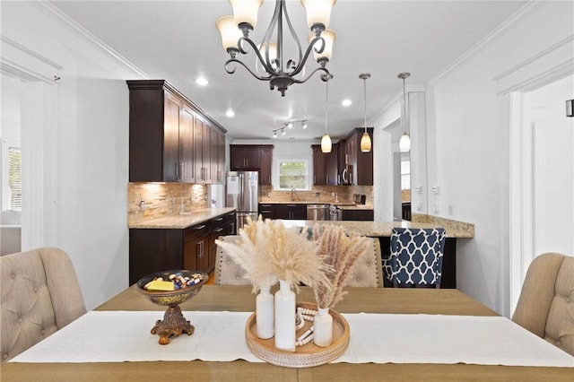 224 Lyell Ave, Ogden, NY 14559 - dining room featuring a chandelier, ornamental molding, and recessed lighting