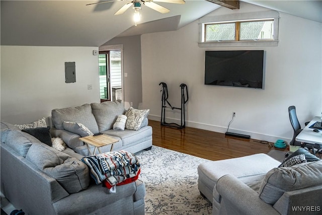 7401 Seneca St, Elma, NY 14052 - living area featuring electric panel, wood finished floors, vaulted ceiling, a ceiling fan, and baseboards