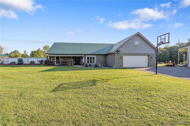 484 Chesbro Rd, Schroeppel, NY 13132 - view of front facade with asphalt driveway, a garage, and a porch