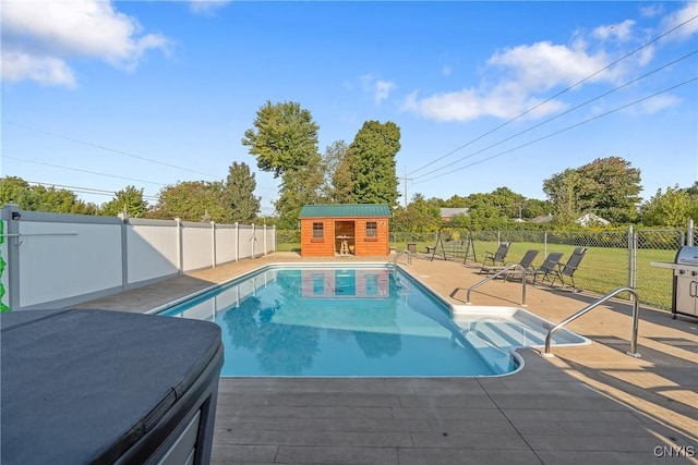 484 Chesbro Rd, Schroeppel, NY 13132 - view of swimming pool featuring an outdoor structure and a patio area