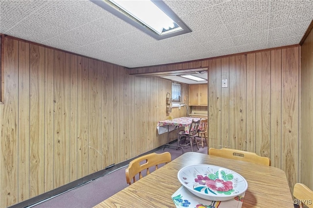 329 Hazelhurst Ave, Syracuse, NY 13206 - carpeted dining room featuring wood walls