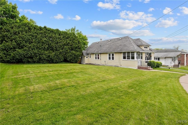 329 Hazelhurst Ave, Syracuse, NY 13206 - back of house with a yard