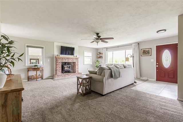 2935 Main St, York, NY 14533 - living area with light colored carpet, a ceiling fan, plenty of natural light, and baseboards