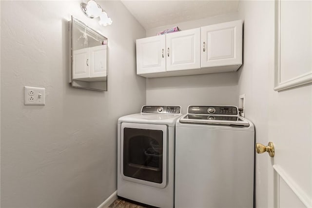 2935 Main St, York, NY 14533 - laundry area featuring separate washer and dryer, cabinet space, and wood finished floors