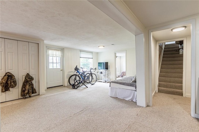 2935 Main St, York, NY 14533 - carpeted bedroom with a closet and a textured ceiling