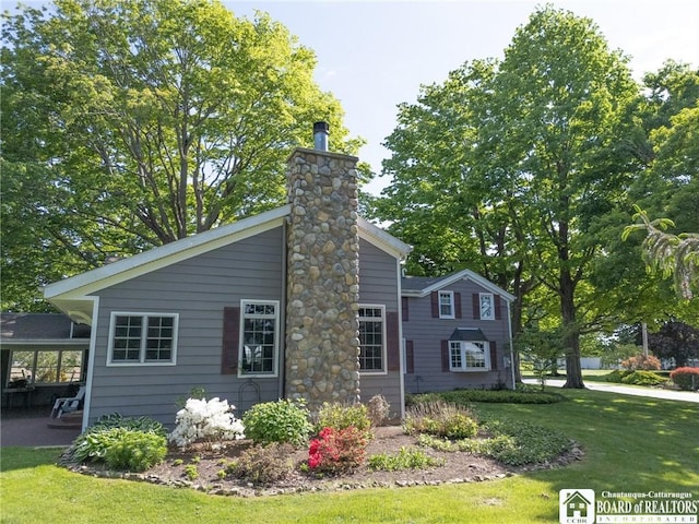 10280 Christy Rd, Sheridan, NY 14063 - view of side of home with a chimney and a lawn