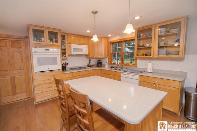 10280 Christy Rd, Sheridan, NY 14063 - kitchen featuring white appliances, light countertops, dark wood-style floors, a center island, and recessed lighting