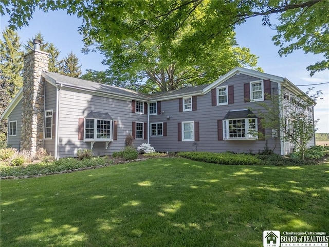 10280 Christy Rd, Sheridan, NY 14063 - view of front of home featuring a chimney and a front yard
