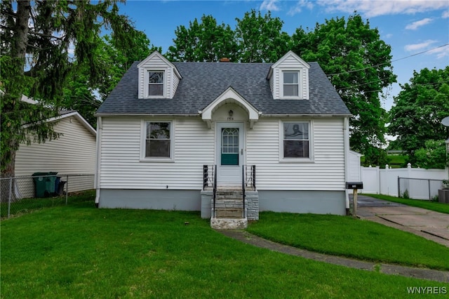7514 Stephenson Ave, Niagara Falls, NY 14304 - cape cod house featuring roof with shingles