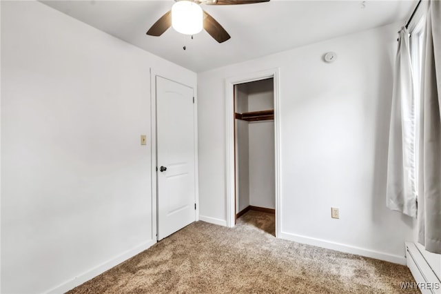 7514 Stephenson Ave, Niagara Falls, NY 14304 - unfurnished bedroom featuring a baseboard heating unit, carpet floors, baseboards, a closet, and ceiling fan