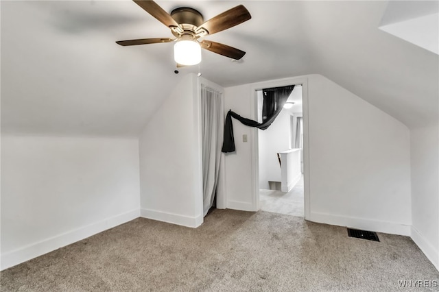 7514 Stephenson Ave, Niagara Falls, NY 14304 - bonus room featuring carpet, vaulted ceiling, a ceiling fan, and baseboards