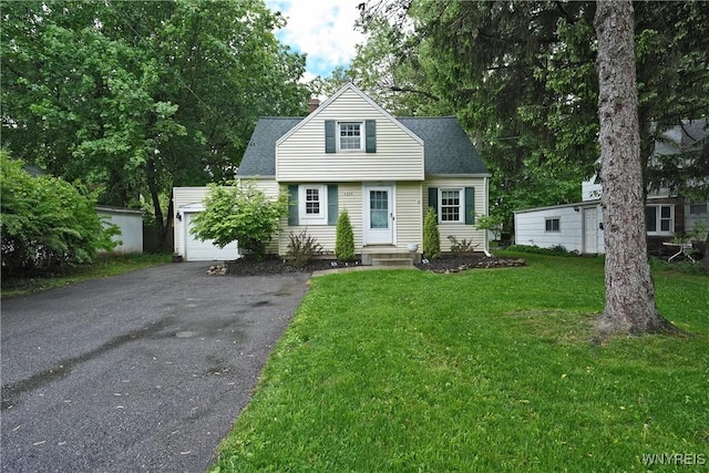 4334 Connection Dr, Clarence, NY 14221 - view of front of home featuring a chimney, a front lawn, a shingled roof, and asphalt driveway
