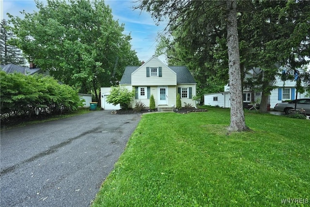 4334 Connection Dr, Clarence, NY 14221 - view of front of house featuring a front lawn, driveway, and a garage