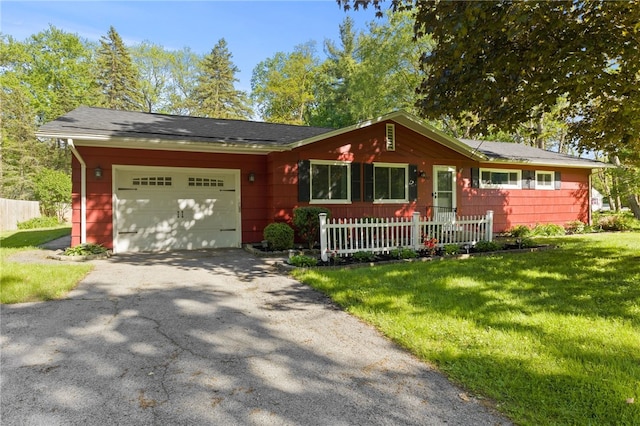 482 Marsh Rd, Pittsford, NY 14534 - ranch-style home featuring an attached garage and asphalt driveway