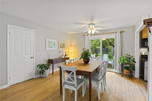 482 Marsh Rd, Pittsford, NY 14534 - dining area featuring ceiling fan, light wood finished floors, and baseboards