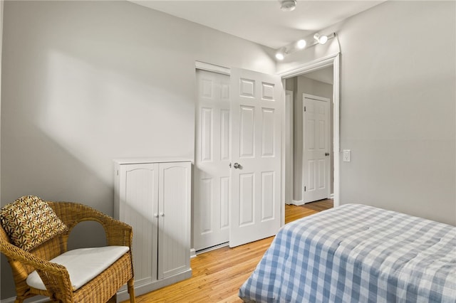 482 Marsh Rd, Pittsford, NY 14534 - bedroom with light wood-style floors and a closet
