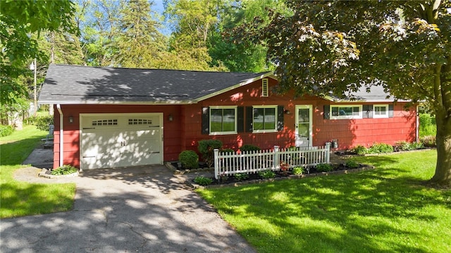 482 Marsh Rd, Pittsford, NY 14534 - ranch-style house featuring an attached garage, driveway, a front lawn, and roof with shingles