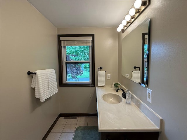 300 Amy Ln, Clarkson, NY 14420 - bathroom with tile patterned flooring, vanity, and baseboards