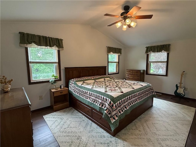 300 Amy Ln, Clarkson, NY 14420 - bedroom featuring vaulted ceiling, wood finished floors, baseboards, and ceiling fan