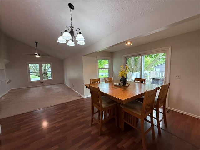 300 Amy Ln, Clarkson, NY 14420 - dining area with plenty of natural light, dark wood-type flooring, a chandelier, a textured ceiling, and lofted ceiling