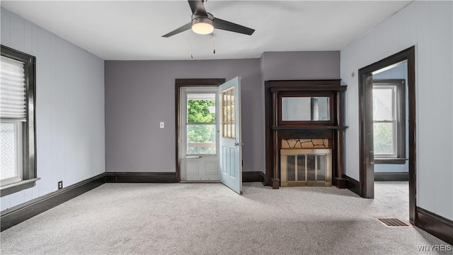 35 Duerstein St, Buffalo, NY 14210 - unfurnished living room with carpet floors, ceiling fan, and baseboards