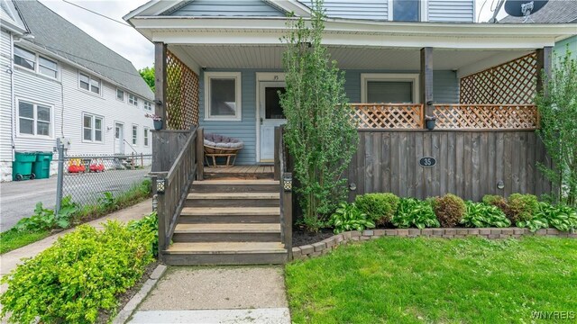 35 Duerstein St, Buffalo, NY 14210 - doorway to property featuring a porch