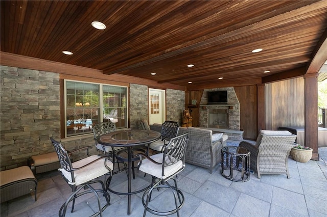 72 Meadow Cove Rd, Pittsford, NY 14534 - view of patio with an outdoor stone fireplace and outdoor dining space