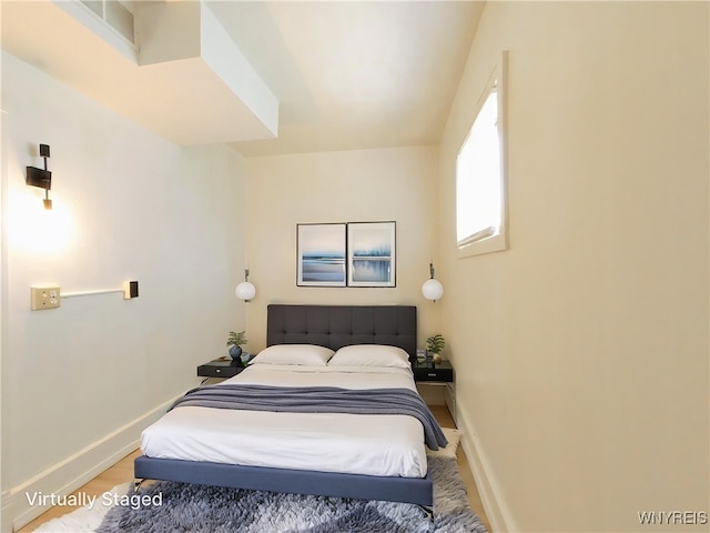 40 Federal Ave, Buffalo, NY 14215 - bedroom featuring baseboards and wood finished floors