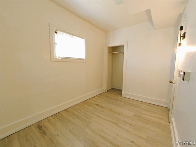 40 Federal Ave, Buffalo, NY 14215 - unfurnished bedroom with baseboards, light wood-type flooring, and a closet