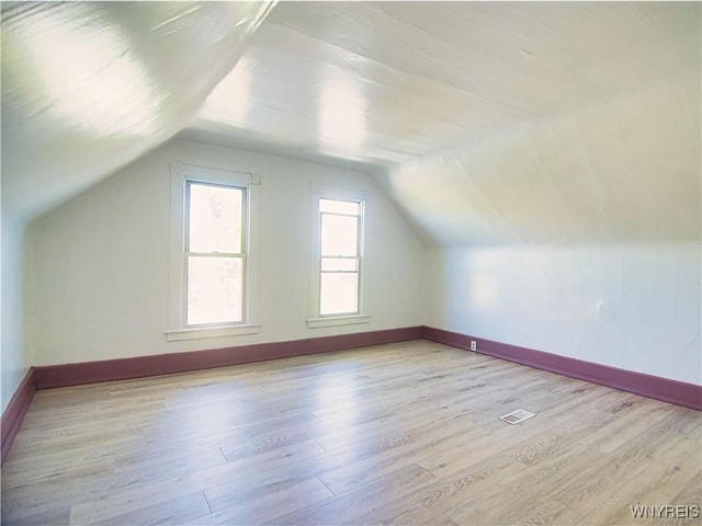 40 Federal Ave, Buffalo, NY 14215 - additional living space featuring light wood-style floors, vaulted ceiling, and baseboards