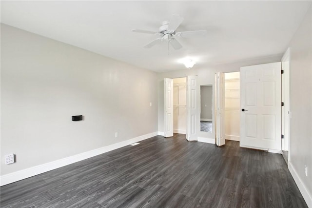 1099 N Greece Rd, Greece, NY 14626 - unfurnished bedroom featuring dark wood-style floors and baseboards