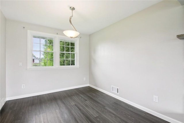 1099 N Greece Rd, Greece, NY 14626 - unfurnished room featuring dark wood finished floors and baseboards