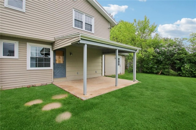 1099 N Greece Rd, Greece, NY 14626 - rear view of house featuring a patio and a yard
