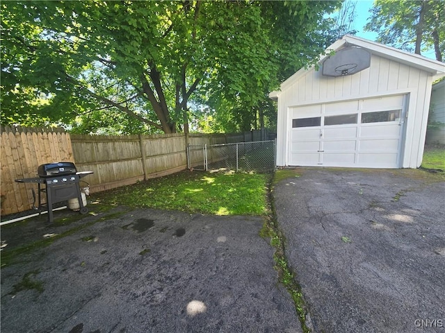 116 Mariposa St, Syracuse, NY 13206 - detached garage featuring driveway