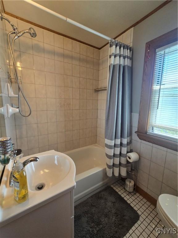 116 Mariposa St, Syracuse, NY 13206 - full bath with ornamental molding, tile walls, shower / bath combination with curtain, toilet, and vanity