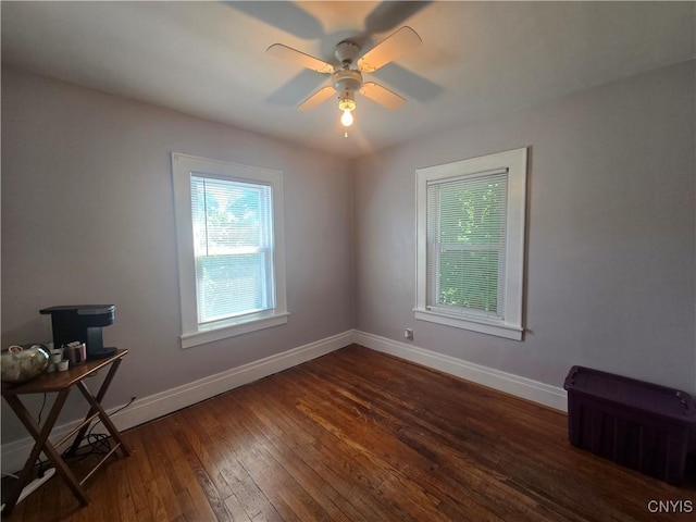 116 Mariposa St, Syracuse, NY 13206 - empty room with dark wood-type flooring, baseboards, and a ceiling fan