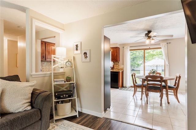 25 Selkirk Dr, Greece, NY 14626 - living room with ceiling fan, baseboards, and light tile patterned flooring