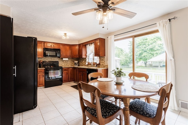 25 Selkirk Dr, Greece, NY 14626 - dining space with ceiling fan and light tile patterned flooring