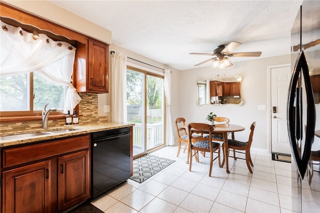 25 Selkirk Dr, Greece, NY 14626 - kitchen with black appliances, a sink, decorative backsplash, ceiling fan, and light stone countertops
