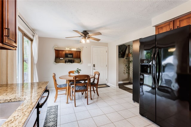 25 Selkirk Dr, Greece, NY 14626 - dining area with a ceiling fan, baseboards, a textured ceiling, and light tile patterned flooring