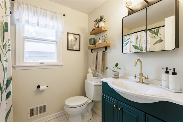 25 Selkirk Dr, Greece, NY 14626 - bathroom featuring toilet, vanity, baseboards, and tile patterned flooring