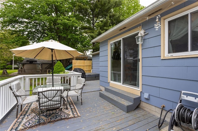 25 Selkirk Dr, Greece, NY 14626 - wooden deck featuring outdoor dining area and entry steps