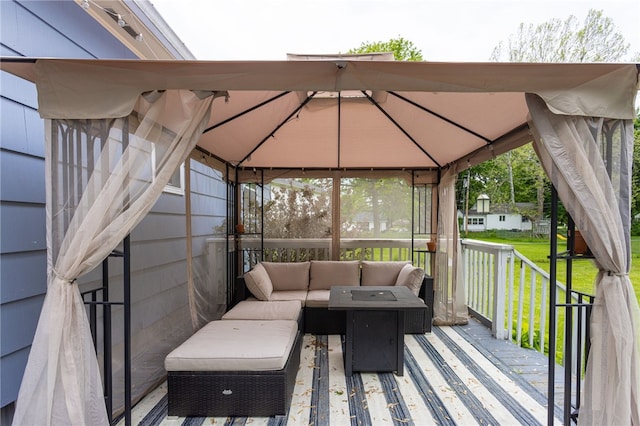 25 Selkirk Dr, Greece, NY 14626 - wooden deck featuring a gazebo, outdoor lounge area, and a lawn